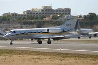 N500JW @ TNCM - Back tracking runway 09