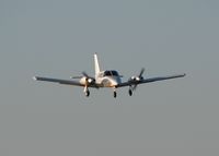 N21437 @ DTN - Landing at the Downtown Shreveport airport. - by paulp