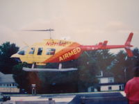 N911ME - Aircraft lifting off from H D Goodall Hospital in Sanford, Maine. N911ME was lost over Casco Bay with medical crew and pt. November 19, 1993 - by Carl W. French
