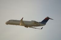 N408CA @ KCID - Taking off Runway 9 into the early morning sun.  Seen from my office. - by Glenn E. Chatfield