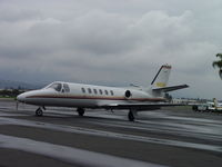 N15XM @ POC - Parked at Brackett Transient Parking on a rainy day - by Helicopterfriend