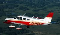 N43044 @ ANE - 1974 Archer in flight - by Greg Smit