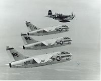 N33693 @ LEMORE NAS - LYNN GARRISON IN HIS F4U-7 LEADS VA-147 AFTER GRADUATION CEREMONY. FIRST UNIT TO DEPLOY A7 IN VIET NAME - by NAVY PETTY OFFICER IN A-4