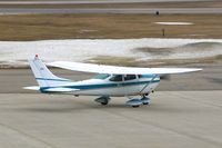 N3167F @ CID - Taxiing past the tower on the way to runway 13 - by Glenn E. Chatfield