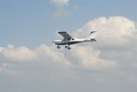 N595J @ 1T7 - J250 in flight - by Floyd Wilkes