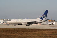 HP-1375CMP @ KMIA - Boeing 737-700
