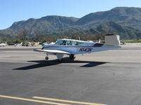 N143K @ SZP - 1964 Beech S35 BONANZA, Continental IO-520-B 285 Hp, taxi - by Doug Robertson