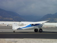 N9770E @ CCB - Taxiing to runway - by Helicopterfriend