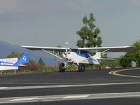 N9770E @ CCB - Waiting for a 2007 Aero (N703GB) to take off - by Helicopterfriend