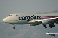 LX-FCV @ VHHH - Cargolux approaching 25R - by Michel Teiten ( www.mablehome.com )