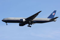 N773UA @ IAD - United Airlines N773UA (FLT UAL947) from Amsterdam Schiphol Airport (EHAM), with a mis-matched engine cowl, on short-final to RWY 1R.