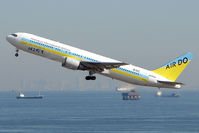 JA98AD @ RJTT - Air Do B767 lifts off from Haneda