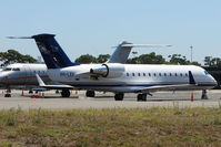 VH-LEF @ YSSY - Executive Challenger 850 at Sydney - by Terry Fletcher