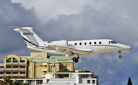 N650CD @ TNCM - Landing at Princess Juliana Airport.