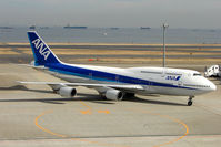 JA8965 @ RJTT - ANA B747 taxies in at Haneda