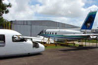 ZK-DCH @ YCUD - Two Emb110 frames sit outside the Queensland Insitute for Aviation Engineering at Caloundra, Queensland Australia - ZK-DCH (white) & ZK-KIP ex NZ Airlink - by Terry Fletcher