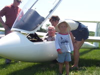 C-GGTI - Owner/Pilot with grandson - by Carl Juergensen