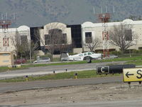 N7521N @ POC - Taxiing to Runway 26R at Brackett - by Helicopterfriend