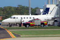 VH-BQB @ YBMC - Thi mid-day heat haze makes this EMB110 shimmer - by Terry Fletcher