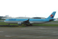 HL7584 @ YBBN - Korean A330 taxies out on a grey Brisbane morning - by Terry Fletcher