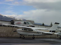 N6YY @ CCB - Parked in the rain, northside of Cable - by Helicopterfriend