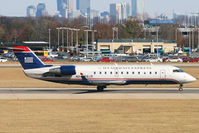 N248PS @ KCLT - Taken from the overlook on the west side of the Charlotte Douglas International Airport. - by Bradley Bormuth