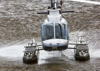 N490WM - Float landing - by Pat Lynch