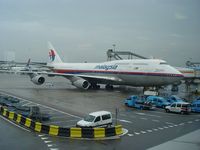 9M-MPC @ EHAM - Parked at gate F03 - by J.W. Aarts