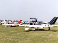 G-BTIE @ EGTC - Socata TB-10 Tobago G-BTIE and TB-9 Tampico G-BIXB at the 1981 Cranfield Business and Light Aviation Exhibition