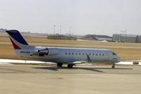N699BR @ CID - Taxiing to Ruway 13 for departure