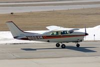 N1664M @ CID - Taxiing to Landmark FBO, as seen from my office window. - by Glenn E. Chatfield