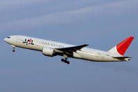 JA8985 @ RJTT - JAL B777 climbs out of Haneda