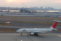 JA8376 @ RJTT - JAL A300 about to taxy as last light fades over Tokyo Haneda
