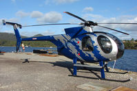 VH-MDL - Hughes 369D on the Strahan Helipad , West Tasmania - by Terry Fletcher