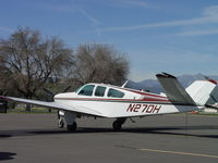 N27DH @ POC - Parked in transient parking at Brackett - by Helicopterfriend