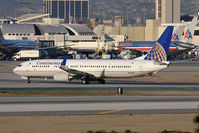 N75426 @ LAX - Continental Airlines N75426 (FLT COA137) holding short of RWY 25R after arrival on RWY 25L from Houston Bush Intercontinental (KIAH). - by Dean Heald
