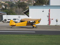 N1592N @ SZP - 1947 Piper J3C-65 CUB, Continental A&C65 65 Hp, taxi to Rwy 04 turnup area - by Doug Robertson