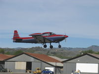 N91533 @ SZP - 1946 North American NAVION, Continental E-185-3 185 Hp, tri-blade prop, tip tanks, window mods, Palo Alto tail, takeoff climb Rwy 04 - by Doug Robertson