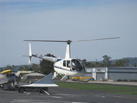 N688SS @ SZP - 2000 Robinson R44 RAVEN, Lycoming O-540 260 Hp derated to 225 Hp at takeoff, 205 Hp continuous, hover approach to landing SZP Helipad - by Doug Robertson