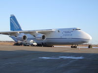 UR-82007 @ IAG - Something different on the West Ramp (GA portion); Trucks have been depositing cargo on the ramp for a few days, waiting for a lift - by Jim Uber