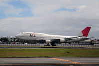 JA8074 @ ARP - JAL B747-400 just before touch down at RPLL. - by BigDaeng