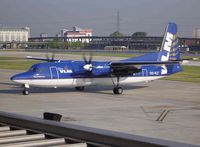 OO-VLZ @ EGLC - Taken through glass from the departure lounge