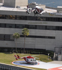 N911EF @ 61FL - Landing pad B at Tampa General Hospital.