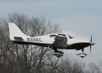 N86KC @ DTN - Landing on runway 14 at the Shreveport Downtown airport. - by paulp