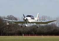 G-BCXE @ EGKH - Contending with cross winds. - by Martin Browne