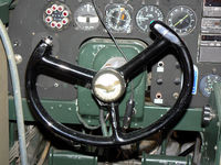 N24927 @ ADS - CAF B-24A ol 927 Pilots control wheel - by Zane Adams