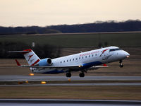 OE-LCP @ VIE - CRJ taking off RW 34