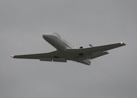 N550CZ @ DTN - Taking off from runway 32 at the Shreveport Downtown airport on an nasty overcast, windy day. - by paulp