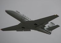 N550CZ @ DTN - Taking off from runway 32 at the Shreveport Downtown airport on a nasty overcast, windy day. - by paulp