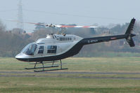 G-BTHY @ EGBJ - Bell 206B at Gloucestershire Airport for re-fuel - by Terry Fletcher